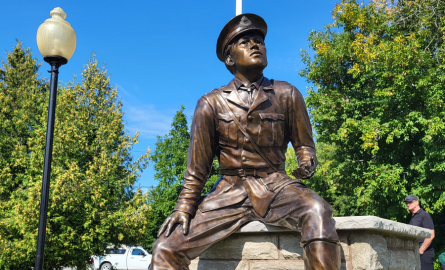 a bronze statue of Captain Roy Brown