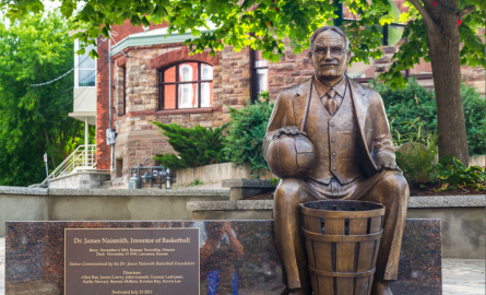 a bronze statue of James Naismith