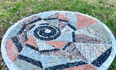 a circular pebble mosaic